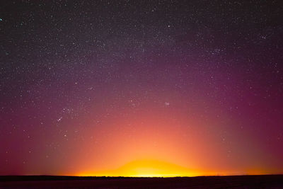 Scenic view of sea against sky at night