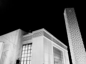 Low angle view of building against sky at night