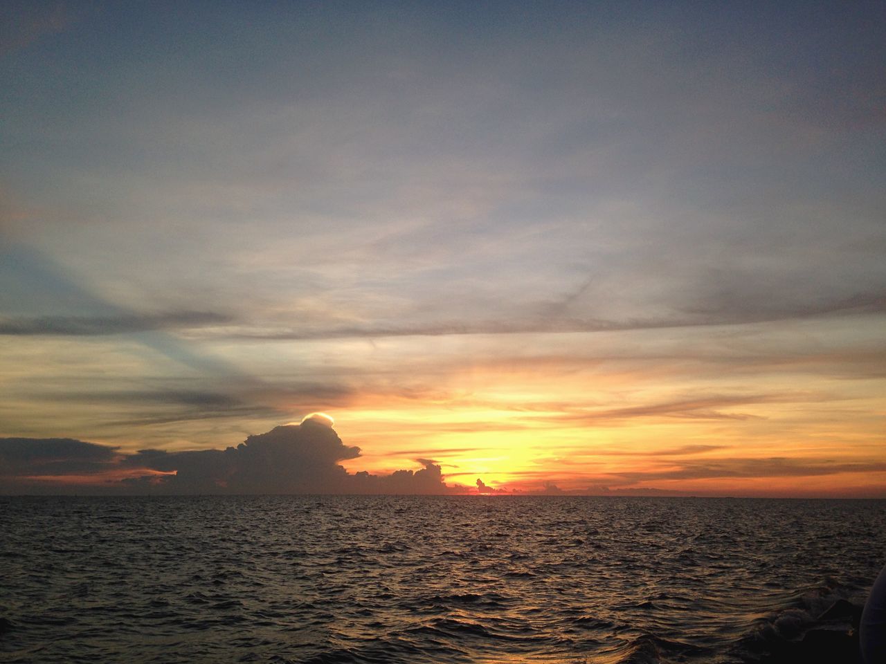 sunset, sea, water, horizon over water, scenics, sky, tranquil scene, beauty in nature, orange color, tranquility, waterfront, idyllic, nature, cloud - sky, cloud, rippled, sun, silhouette, outdoors, no people