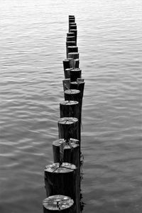 High angle view of wooden post in lake