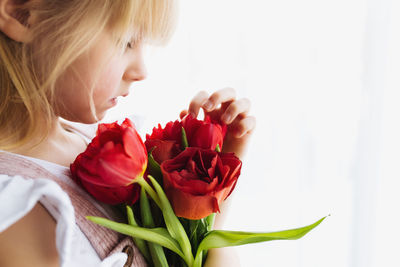 Close-up of rose bouquet against red roses