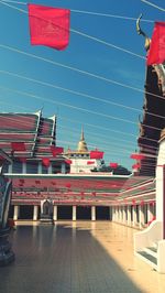 View of flags with building in background