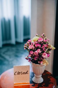 Close-up of flower vase on table