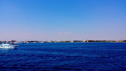 Scenic view of calm sea against clear sky