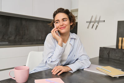 Businesswoman working at desk in office