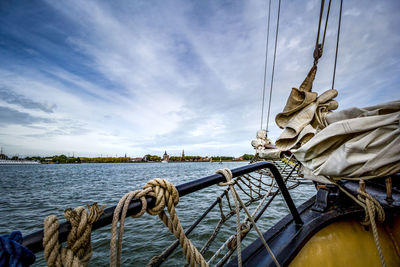 Rope on boat against sky