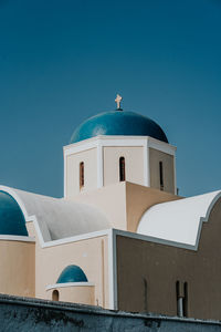 Low angle view of church against clear blue sky