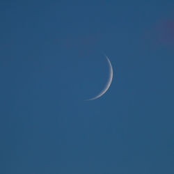 Low angle view of moon in sky