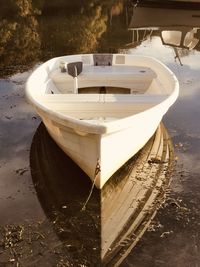 Boats moored in water