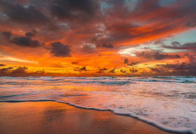 Scenic view of sea against sky during sunset