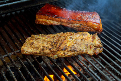 Close-up of meat on barbecue grill