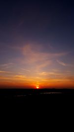 Scenic view of silhouette orange sky during sunset