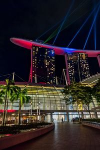 Illuminated bridge at night