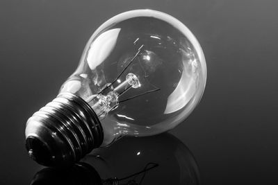 Electric bulb against gray background