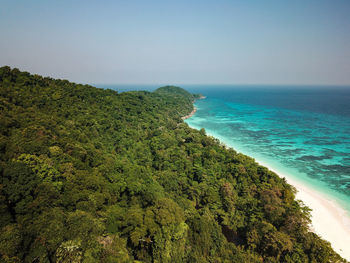 Scenic view of sea against clear blue sky