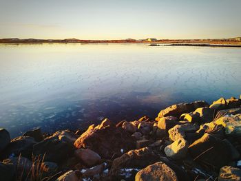 Scenic view of lake against clear sky