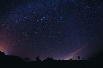 Low angle view of stars in sky at night