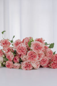 Close-up of roses on table