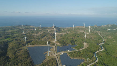 Aerial view of windmills for electric power production on the seashore. bangui windmills 