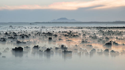 Panoramic view of sea against sky during sunset