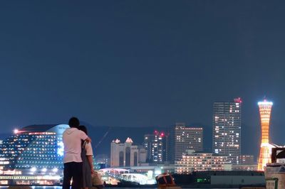 Illuminated cityscape at night