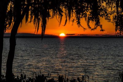 Scenic view of sea at sunset