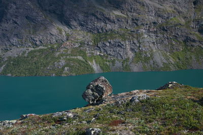 Scenic view of rock formation in lake