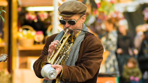 Midsection of man playing outdoors