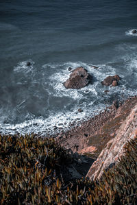 High angle view of rocks on beach