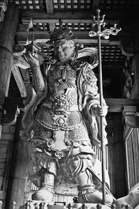 Low angle view of buddha statue