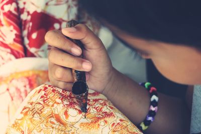 Close-up of girl making art