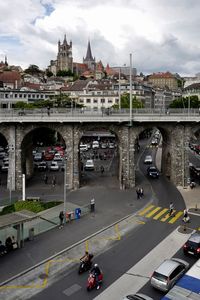 High angle view of bridge in city against sky