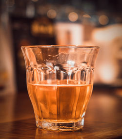 Close-up of beer in glass on table