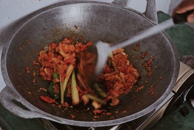 High angle view of meat in cooking pan