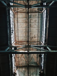 Low angle view of window in abandoned building