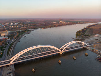 High angle view of bridge over river against buildings