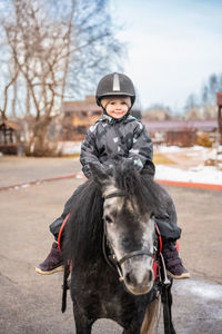 Man riding horse