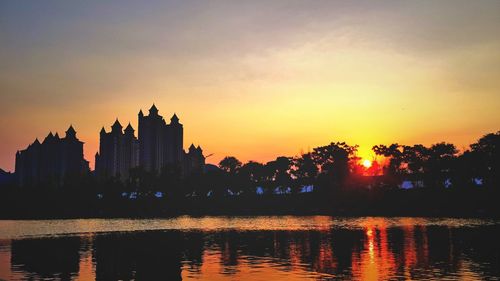 Scenic view of sunset over river