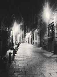 Illuminated street lights at night