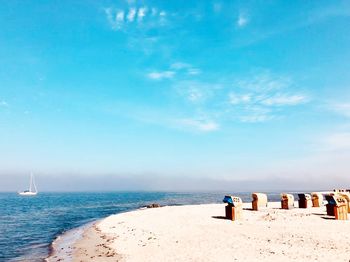 Scenic view of beach against sky