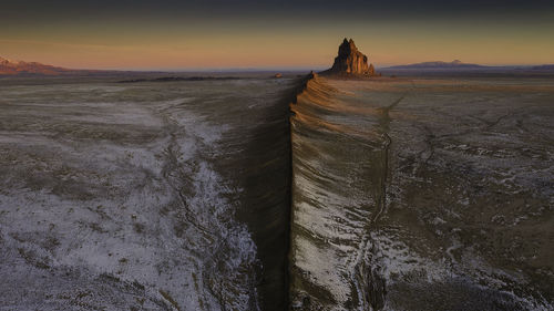 Scenic view of land during sunset