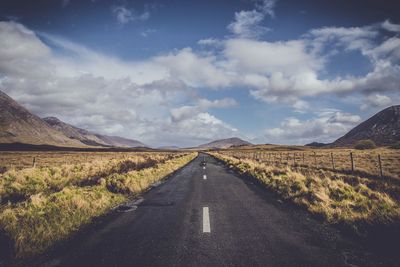 Country road passing through landscape