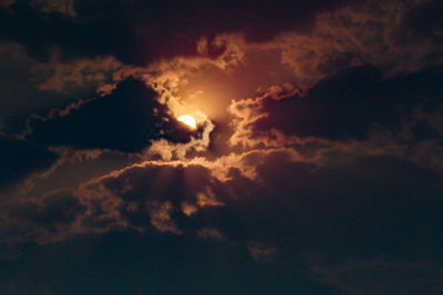 Low angle view of dramatic sky at sunset