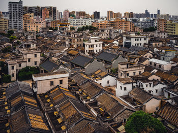 High angle view of residential district against sky