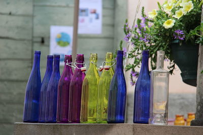 Close-up of purple flower in bottles