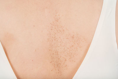 Close-up of woman on white background