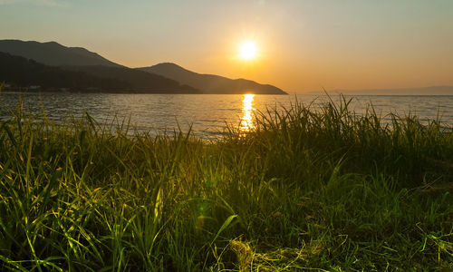 Scenic view of sea against sky during sunset