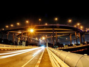 Light trails on road in city at night