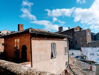 Low angle view of old building against sky