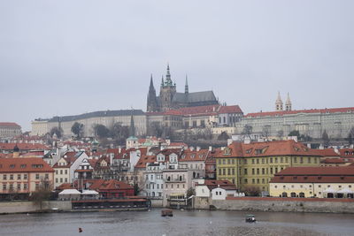 Buildings in city against sky